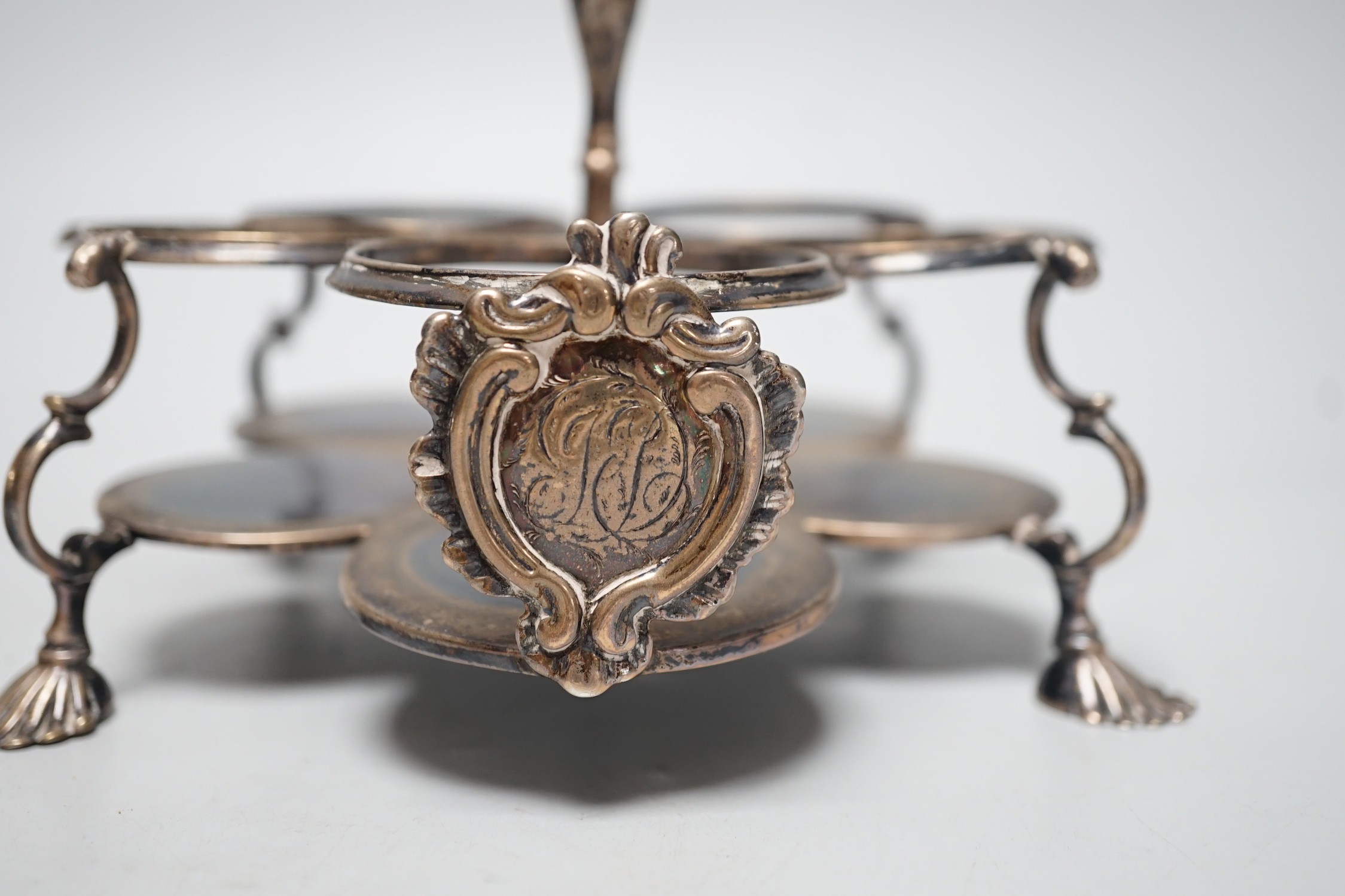 An early George III silver cruet stand, (lacking bottles and piece missing), John Delmester, London, 1763, height 23cm and a Victorian silver salt, 18.4oz.
